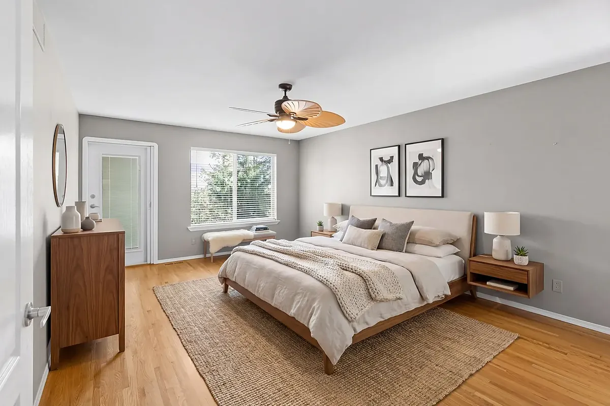 Virtually staged bedroom with neutral furnishings and decor
