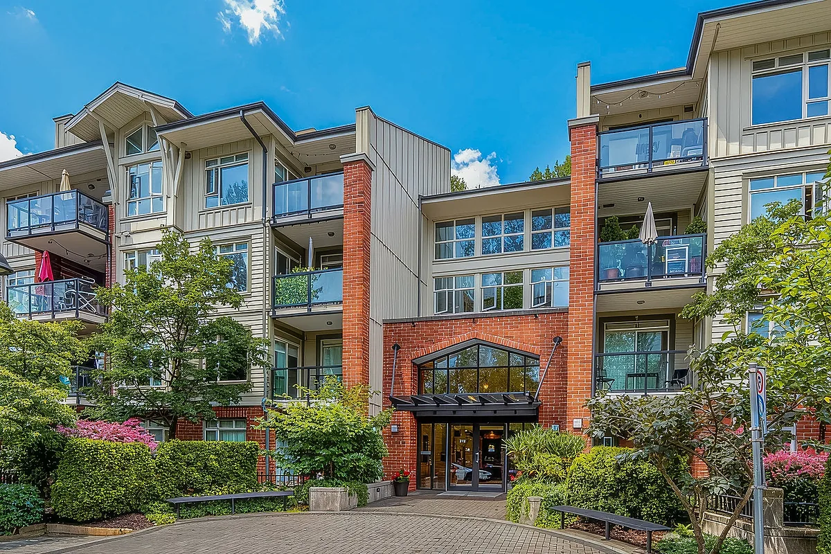 Condo building entrance at 100 Capilano Road, Port Moody