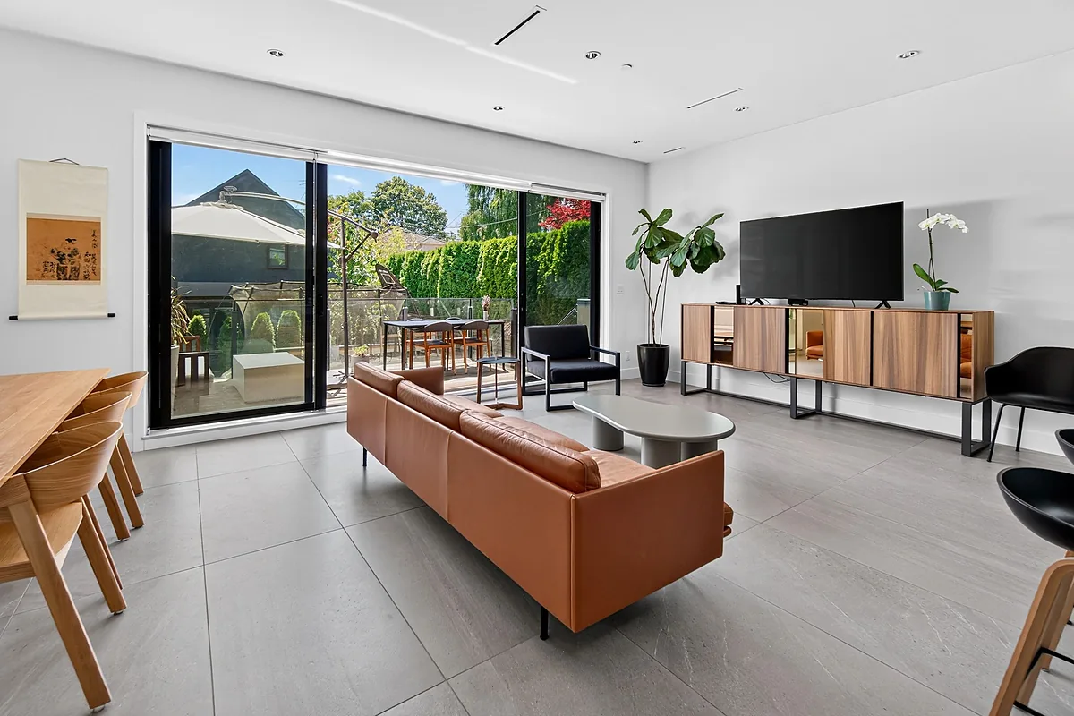 Dining table beside the garden doors in a Vancouver home