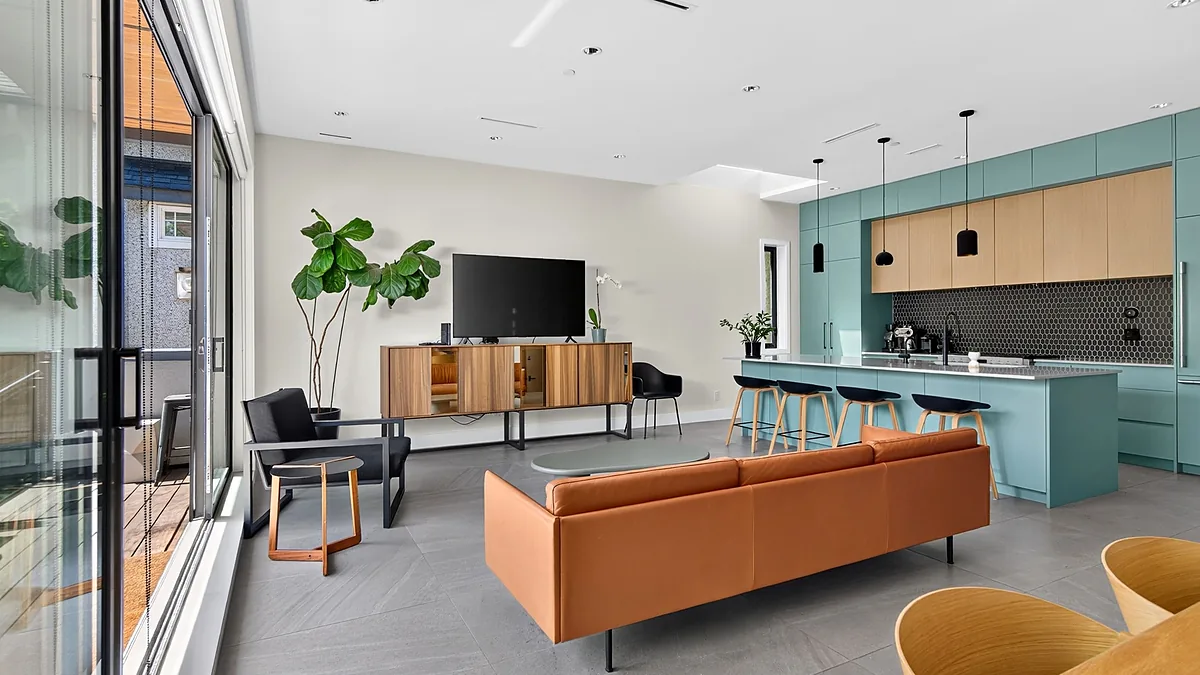 Open-plan kitchen frame from a listing video